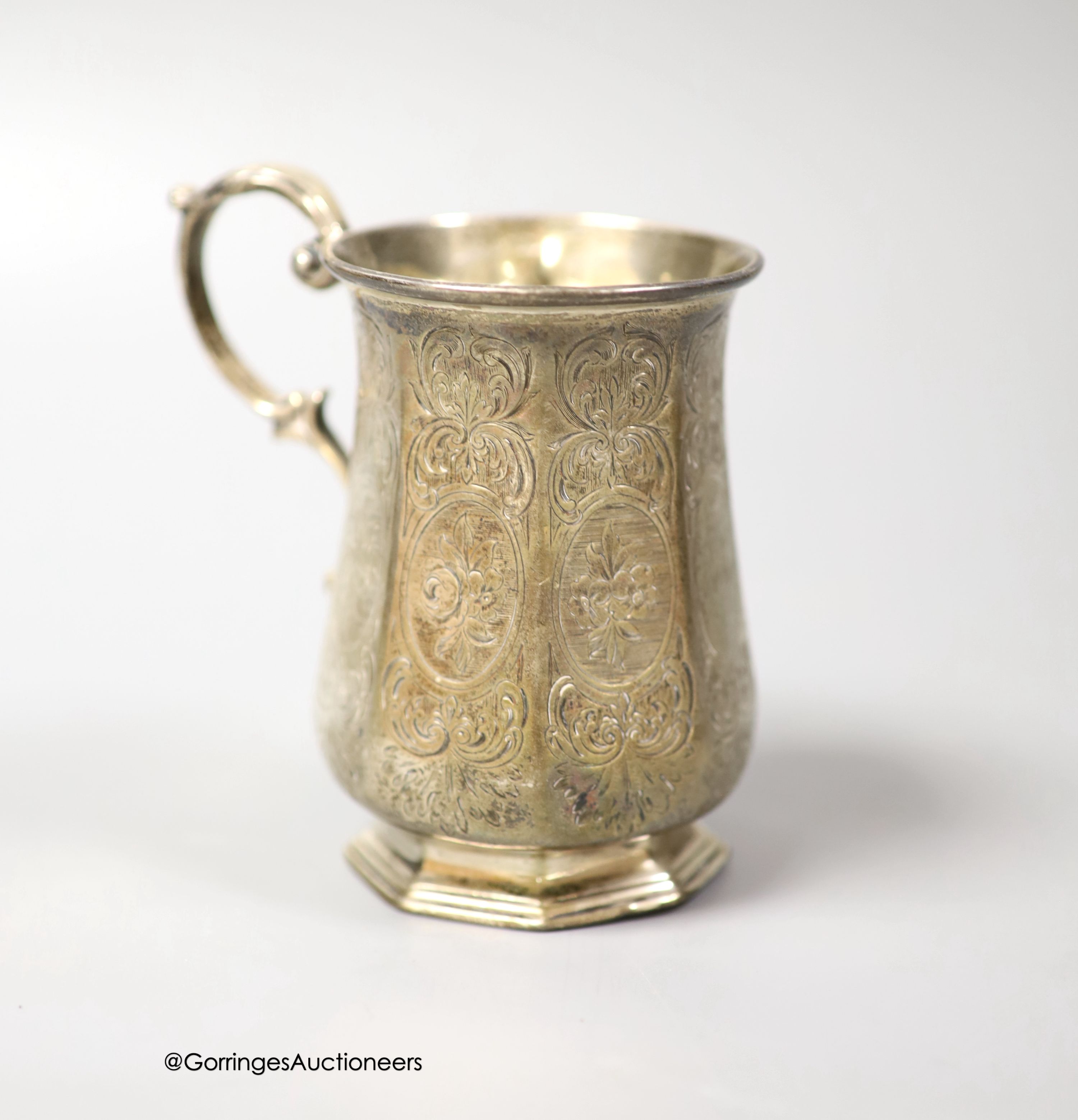 A Victorian engraved silver panelled christening mug, John Evans II, London, 1862, 10.5cm, 152 grams.